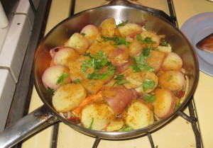 After adding potatoes and spices